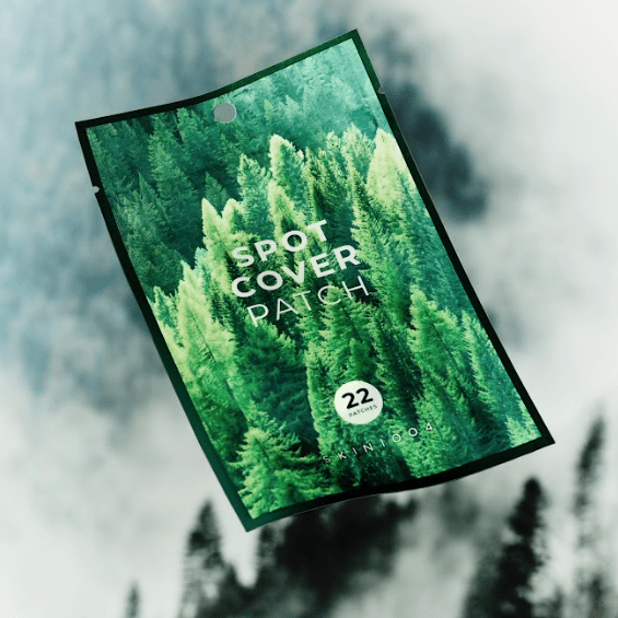 Tea-Trica Spot Cover Patch hägustatud taustal