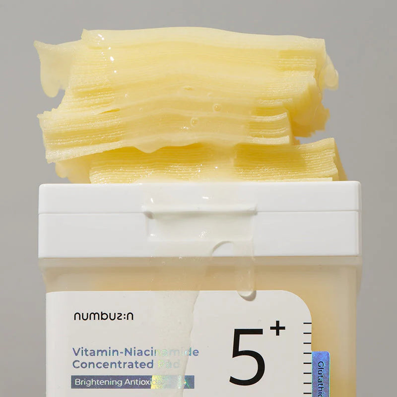 Numbuzin Vitamin Niacinamide Concentrated Pads on top of the product container  