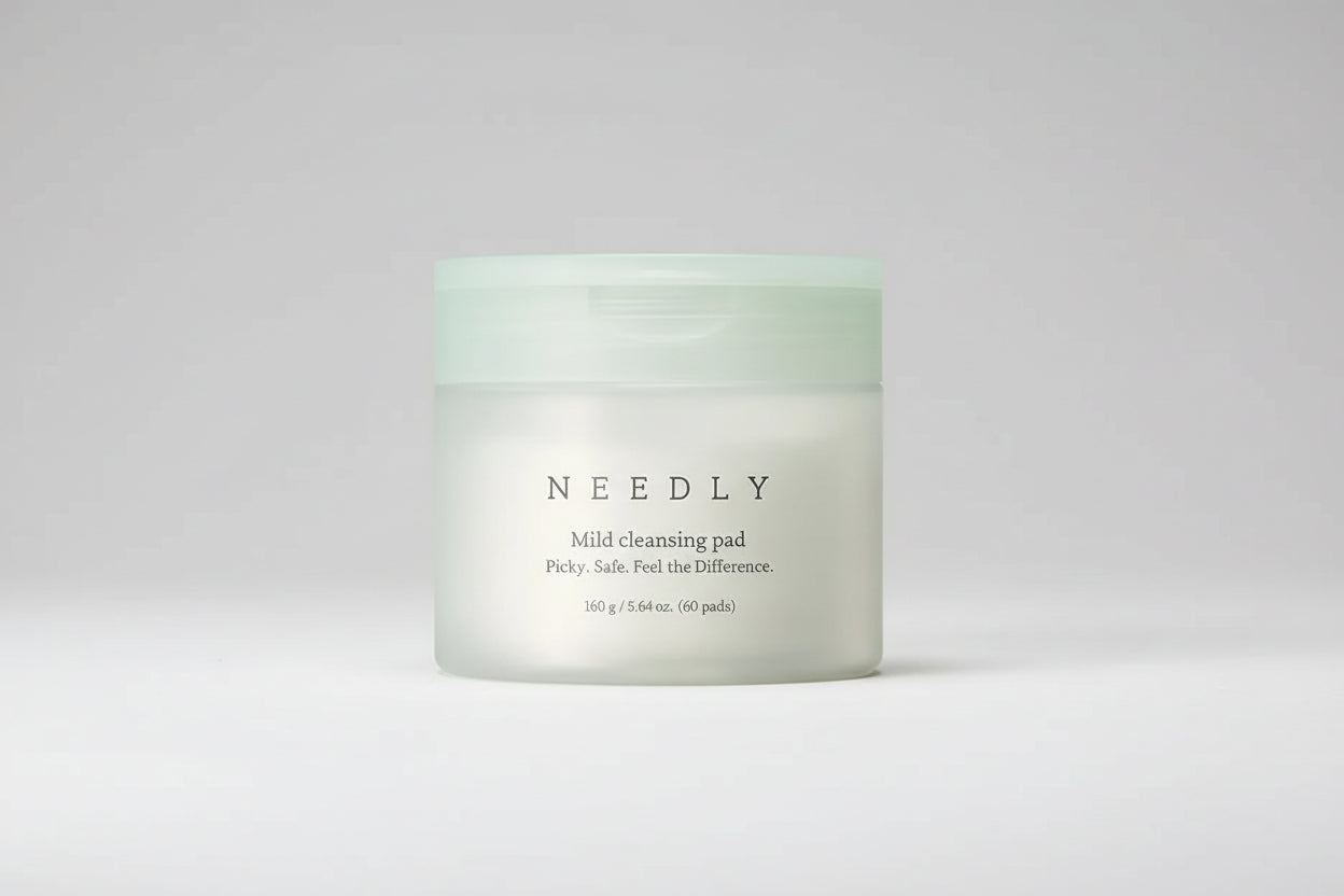 Needly Mild Cleansing Pad purk hallil taustal 