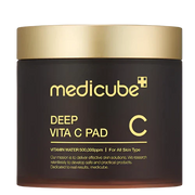MEDICUBE Deep Vita C Pad niisutavad näopadjakesed C-vitamiiniga läbipaistval taustal 
